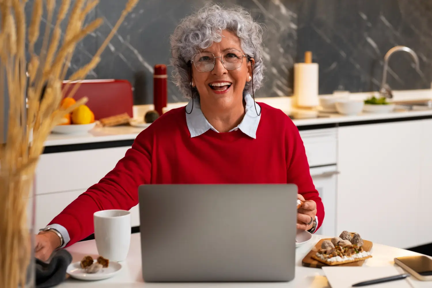old lady in front of laptop